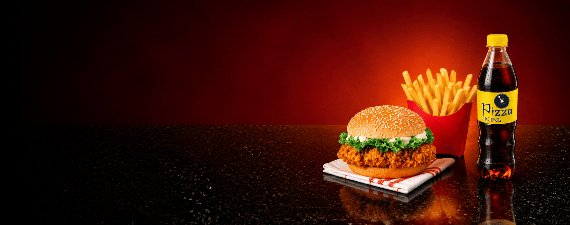 Zinger burger with fries and a drink